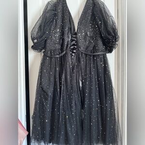 Elegant Black Dress with Gold Accents